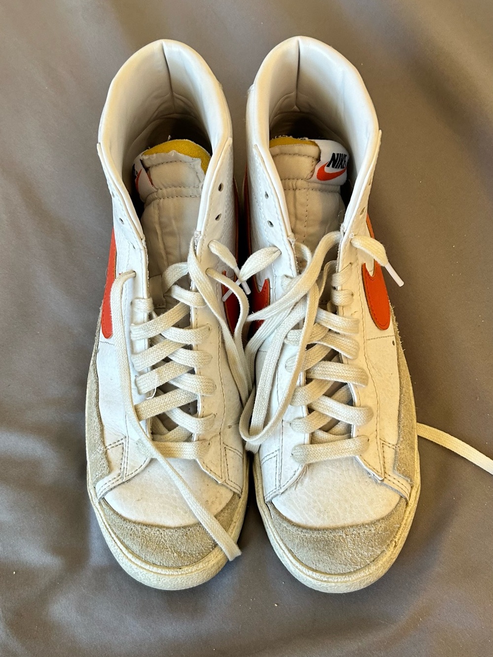 Nike blazer mid shoes with orange Swoosh